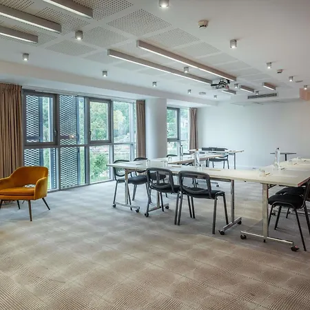 מלון Novotel Centre-confluence Bord De Saone 4*